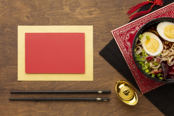 Card mock-up with chinese new year dish Free Photo