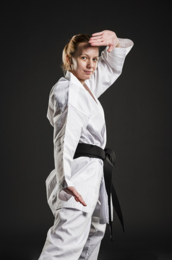 Caucasian karate woman posing medium shot Free Photo Caucasian karate woman posing medium shot Free Photo