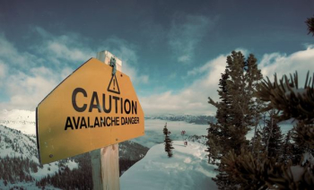 caution avalanche danger signage during winter caution avalanche danger signage during winter