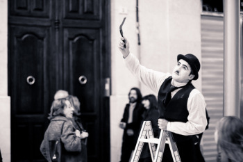 Charlie Chaplin on Top of Ladder Charlie Chaplin on Top of Ladder