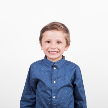 Cheerful boy in blue shirt Cheerful boy in blue shirt