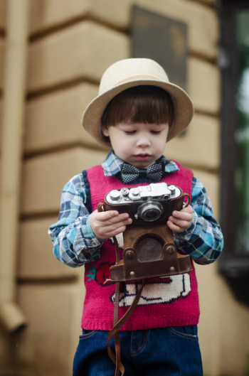 Child Holding Camera Child Holding Camera