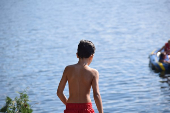 Child Playing Near Lake Child Playing Near Lake