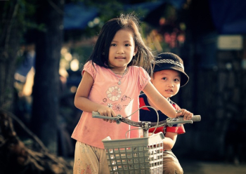 Children Riding Bicycle Children Riding Bicycle