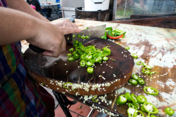 Chopping green hot pepper Chopping green hot pepper