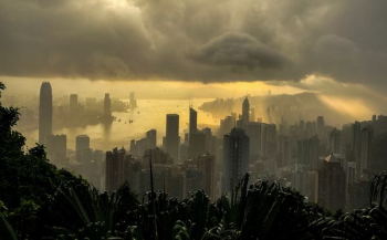 cityscape under cloudy sky at daytime cityscape under cloudy sky at daytime