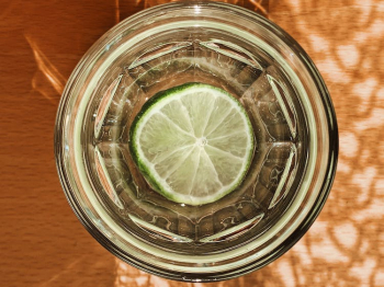 Clear Drinking Glass With Sliced Lemon Clear Drinking Glass With Sliced Lemon