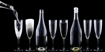 Clear Wine Glasses in a Row Clear Wine Glasses in a Row