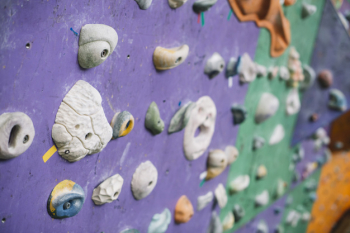 Close-up grips on climbing wall Close-up grips on climbing wall