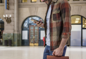 Close-up man using smartphone Free Photo