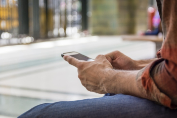 Close-up man using smartphone Free Photo