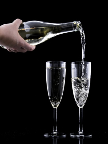 Close-up of Beer Glass Against Black Background