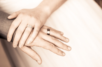 Close-up of Couple Holding Hands Close-up of Couple Holding Hands