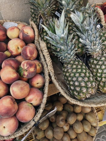 Close-up of Pineapples, Peaches and Kiwis Close-up of Pineapples, Peaches and Kiwis