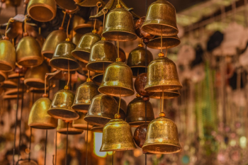 Close-Up Photo of Brass Bells Close-Up Photo of Brass Bells