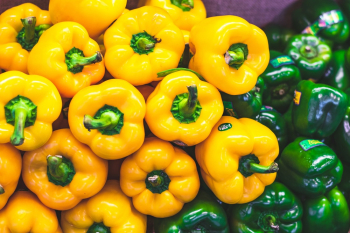 Close-up Photo of Green and Yellow Bell Peppers Close-up Photo of Green and Yellow Bell Peppers