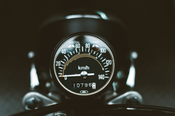 Close-Up Photo of Motorcycle Gauge