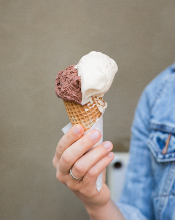 Close-Up Photo of Person Holding Ice Cream Close-Up Photo of Person Holding Ice Cream