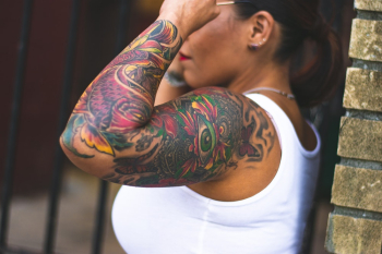 Close-Up Photo of Woman's Arm With Tattoo Close-Up Photo of Woman's Arm With Tattoo