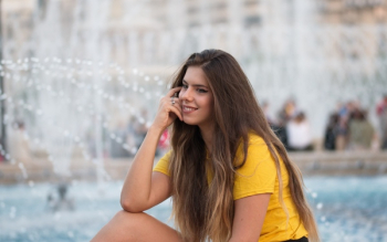 Close-Up Photo of Woman Wearing Yellow Shirt Close-Up Photo of Woman Wearing Yellow Shirt