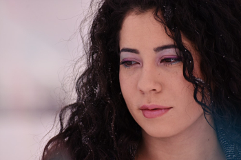 Close-Up Photo of Woman With Curly Hair Close-Up Photo of Woman With Curly Hair