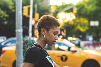 Close-Up Photo of Woman With Curly Hair Close-Up Photo of Woman With Curly Hair