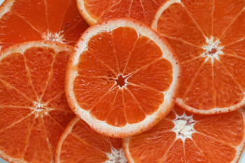 Close Up Photograph of Slices Orange Citrus Fruits