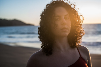 Close-up Portrait Photo of Woman Standing on the Beach Close-up Portrait Photo of Woman Standing on the Beach
