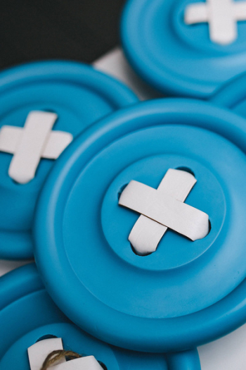 Close-ups of big blue plastic buttons Close-ups of big blue plastic buttons
