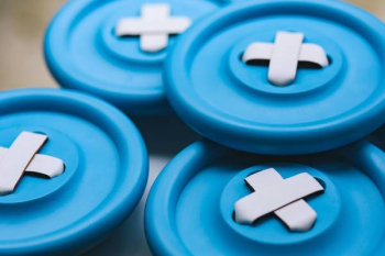 Close-ups of big blue plastic buttons Close-ups of big blue plastic buttons