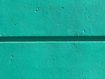 close view of teal color wall close view of teal color wall