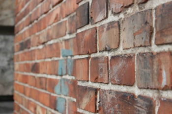 closeup photo of brown bricks closeup photo of brown bricks