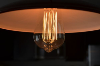 closeup photograph of light bulb closeup photograph of light bulb