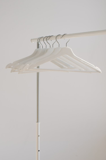 Clothes Hangers Hanging on a Clothes Rack Clothes Hangers Hanging on a Clothes Rack