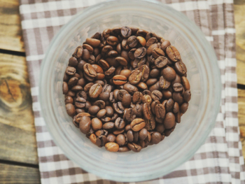 Coffee Beans on Plastic Cup