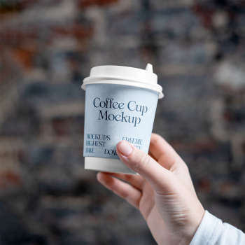 Coffee Cup in Hand Mockup Coffee Cup in Hand Mockup