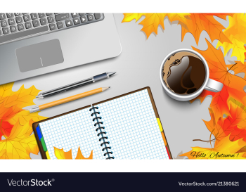 coffee mug on the table with autumn leaves