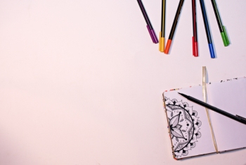 Color Markers on White Surface Near Book Color Markers on White Surface Near Book