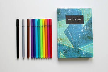 Color Pends Beside Note Book Color Pends Beside Note Book