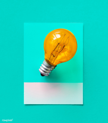 Colorful light bulb on a paper | Free stock photo - 412826 Colorful light bulb on a paper | Free stock photo - 412826