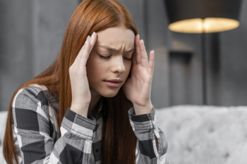 Concerned woman having a headache Free Photo Concerned woman having a headache Free Photo