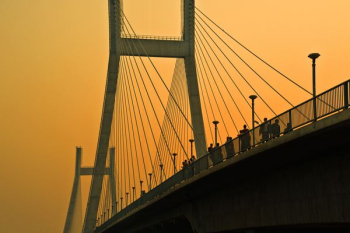 concrete bridge during dawn concrete bridge during dawn