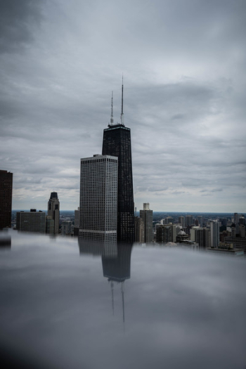 Concrete Building Under Cloudy Sky Concrete Building Under Cloudy Sky