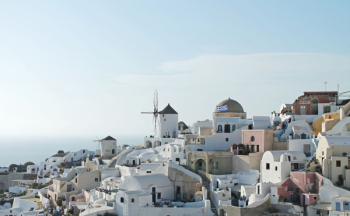 concrete buildings at Santorini, Greece during daytime concrete buildings at Santorini, Greece during daytime