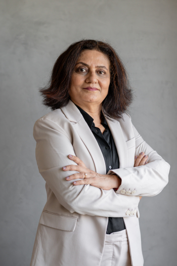 Confident Businesswoman in Professional Attire Confident Businesswoman in Professional Attire