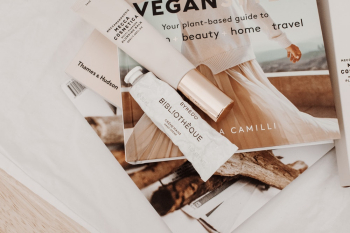 Cosmetic Creams On A Magazine Cosmetic Creams On A Magazine