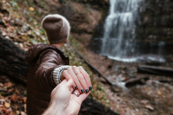 Couple Holds Hands Hiking Waterfalls Couple Holds Hands Hiking Waterfalls