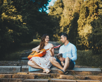 Couple Playing Musical Instrument Couple Playing Musical Instrument