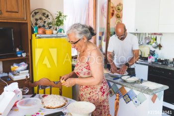 Couple preparing food at home