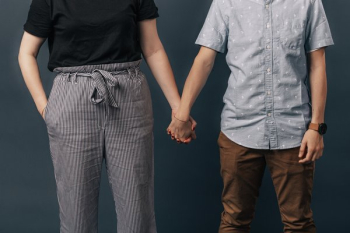 Couple Side By Side Holding Hands Couple Side By Side Holding Hands